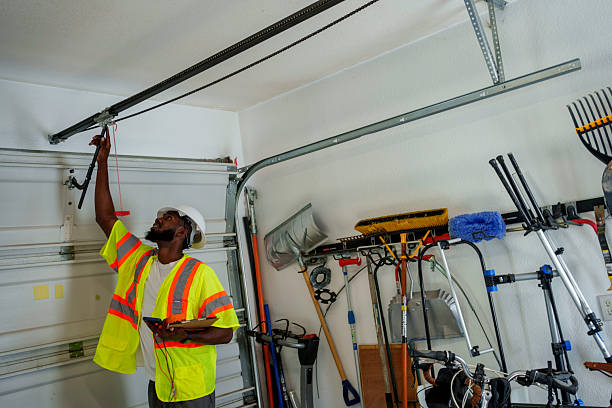 Professional Garage Door Panel Replacement technician working in Forest City, IA